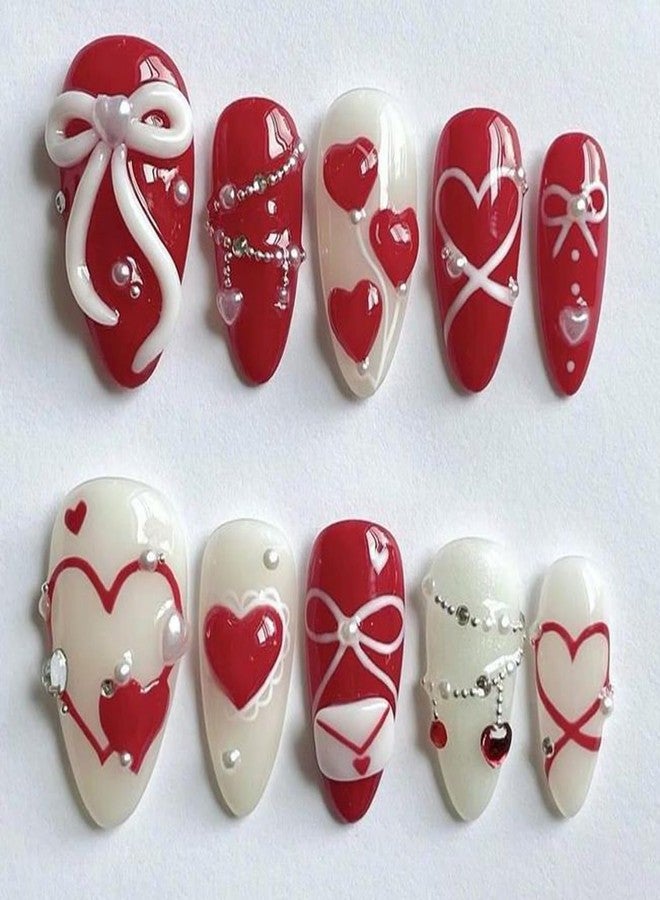 YKZFUI 24Pcs Valentine's Press on Nails Medium Red Heart Fake Nails with 3D Bow Love, White Pearl & Rhinestones Designs French False Nails Tip Stick on Nails Almond Shaped Full Cover Glue on Nails for Women - Image 1
